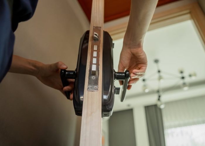 A,Technician,Installs,A,Modern,Smart,Door,Lock,On,The